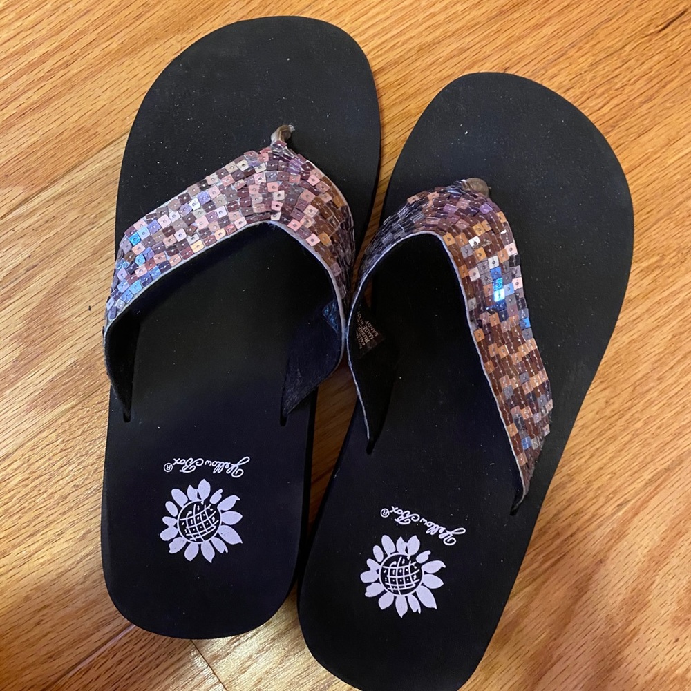 Yellow box flip flops
